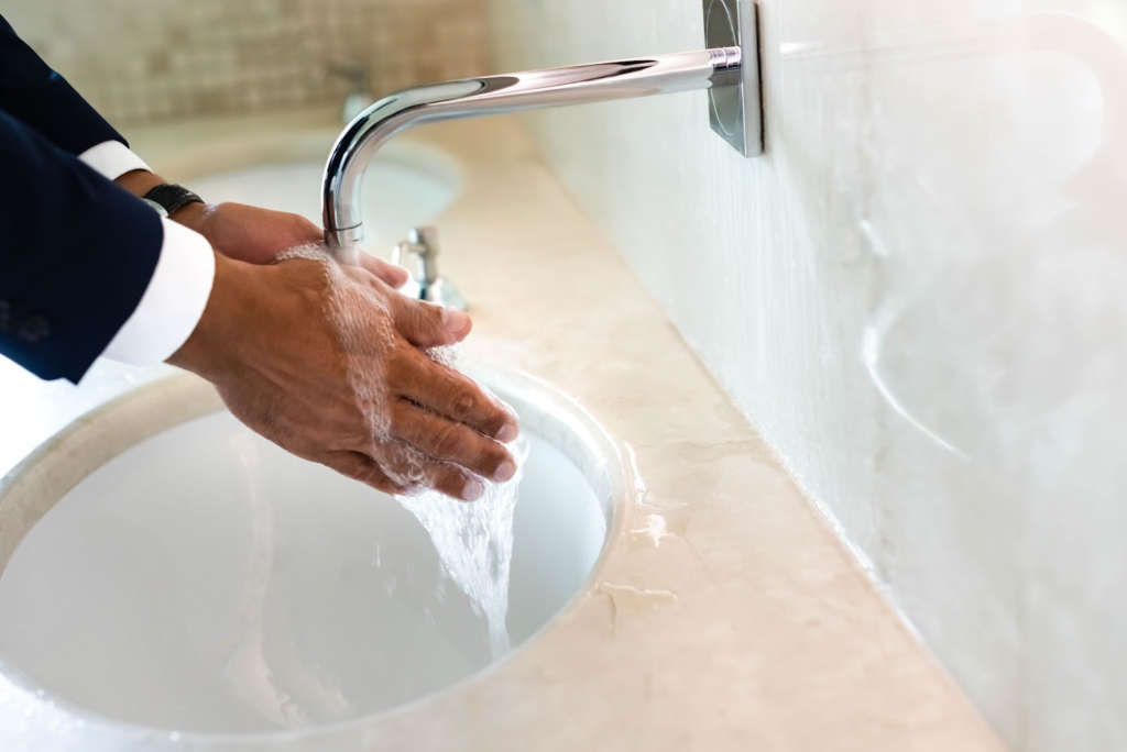 Handwashing in a touch-free faucet