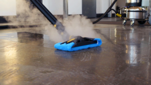 A steam cleaner used for cleaning a restaurant floor